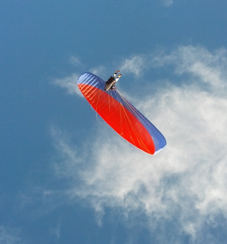 paragliding flying overhead